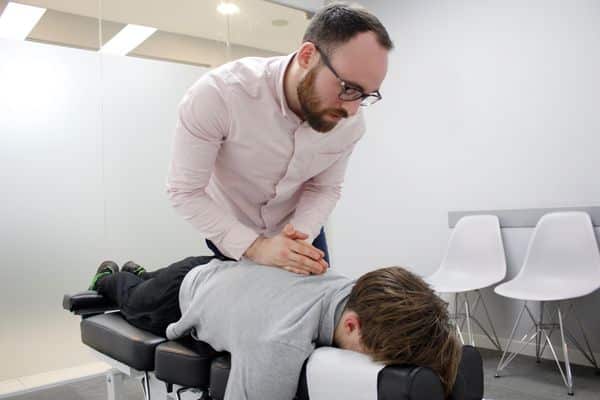 Man having a chiropractic care
