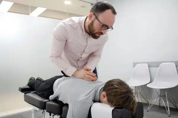 Man having a chiropractic care