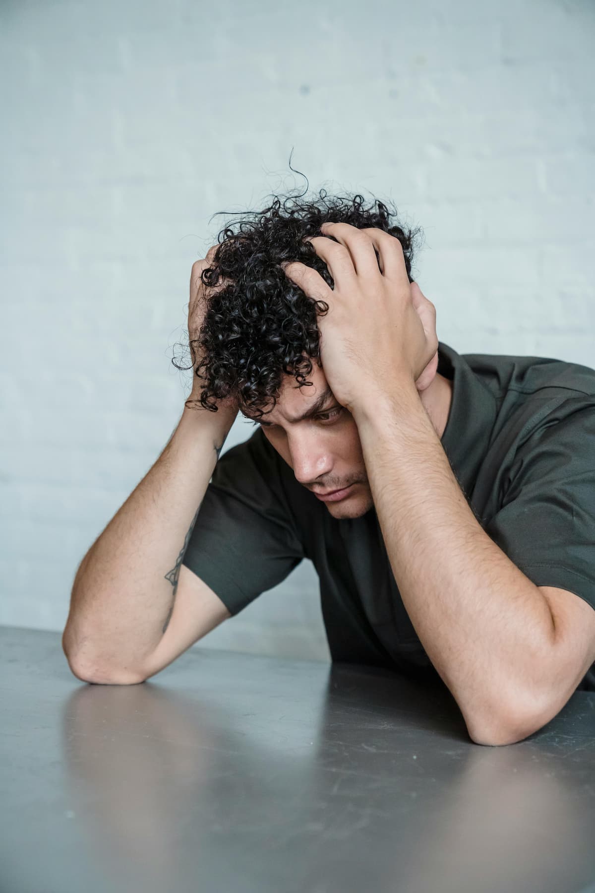Stressed Man Holding His Head