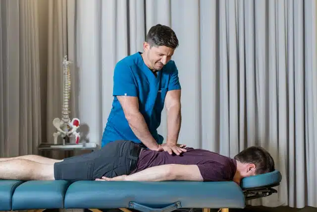 chiropractor-with-a-patient