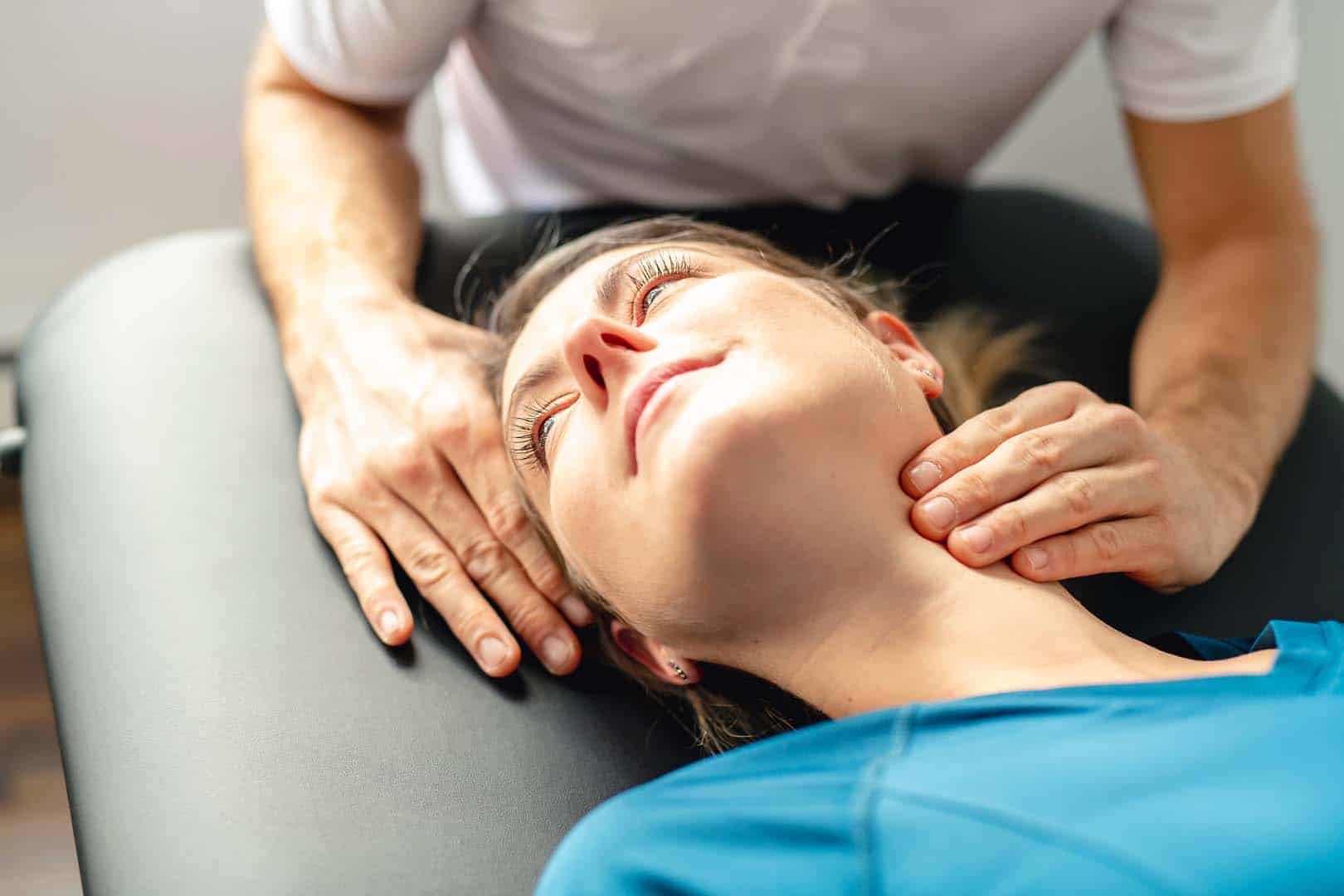 A woman having a chiropractic care treatment