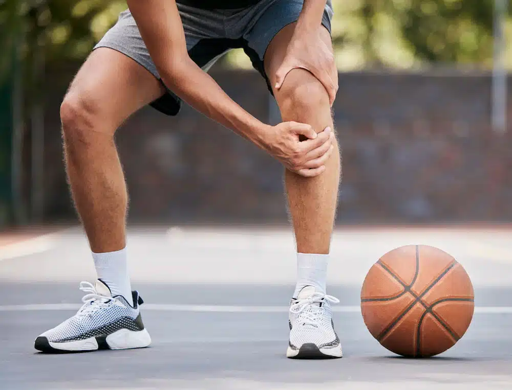 Man has knee injury while playing basketball